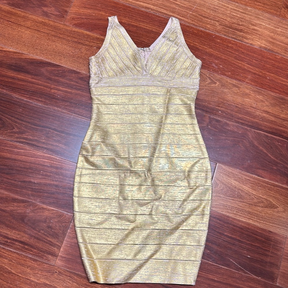 Gorgeous Katie j couture girls dress size large in gold.